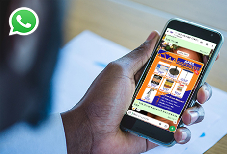 Hand holding smartphone browsing Third Dimension WhatsApp Channel